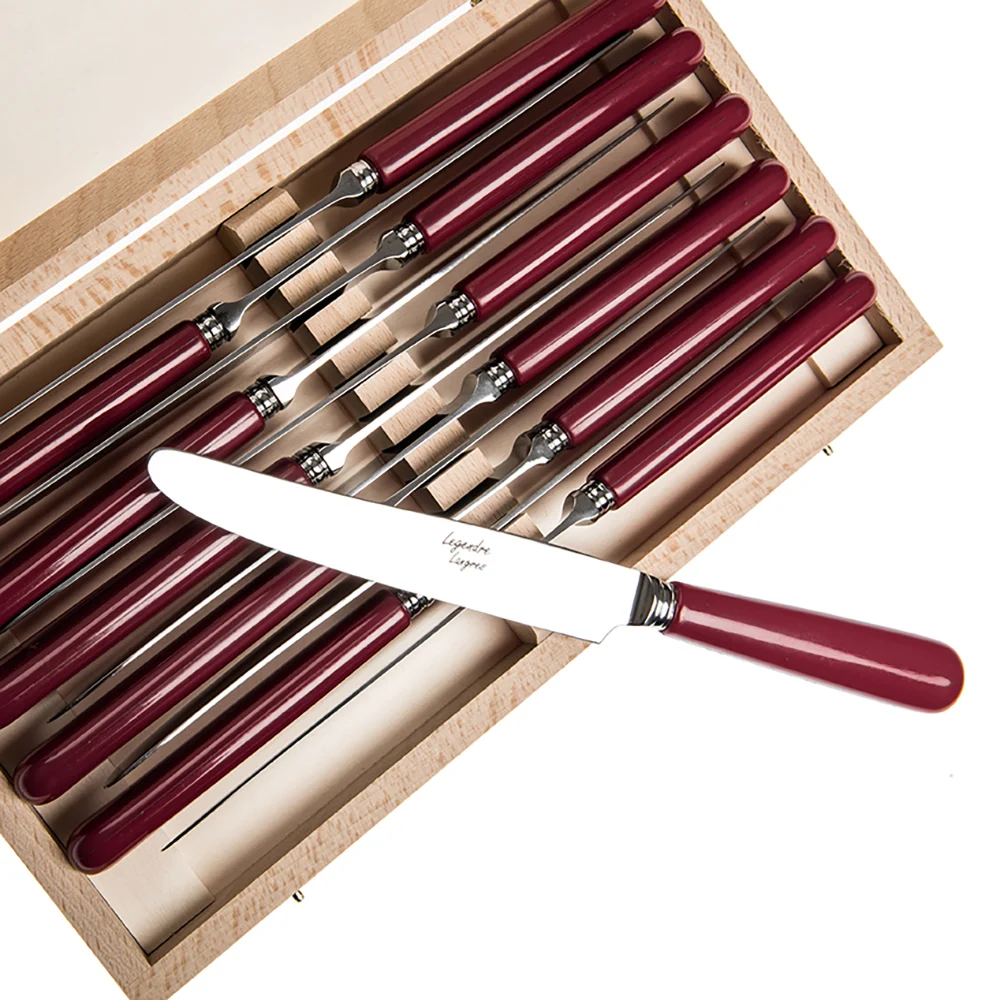 Coffret bois de douze couteaux de table à bout rond et manche rouge